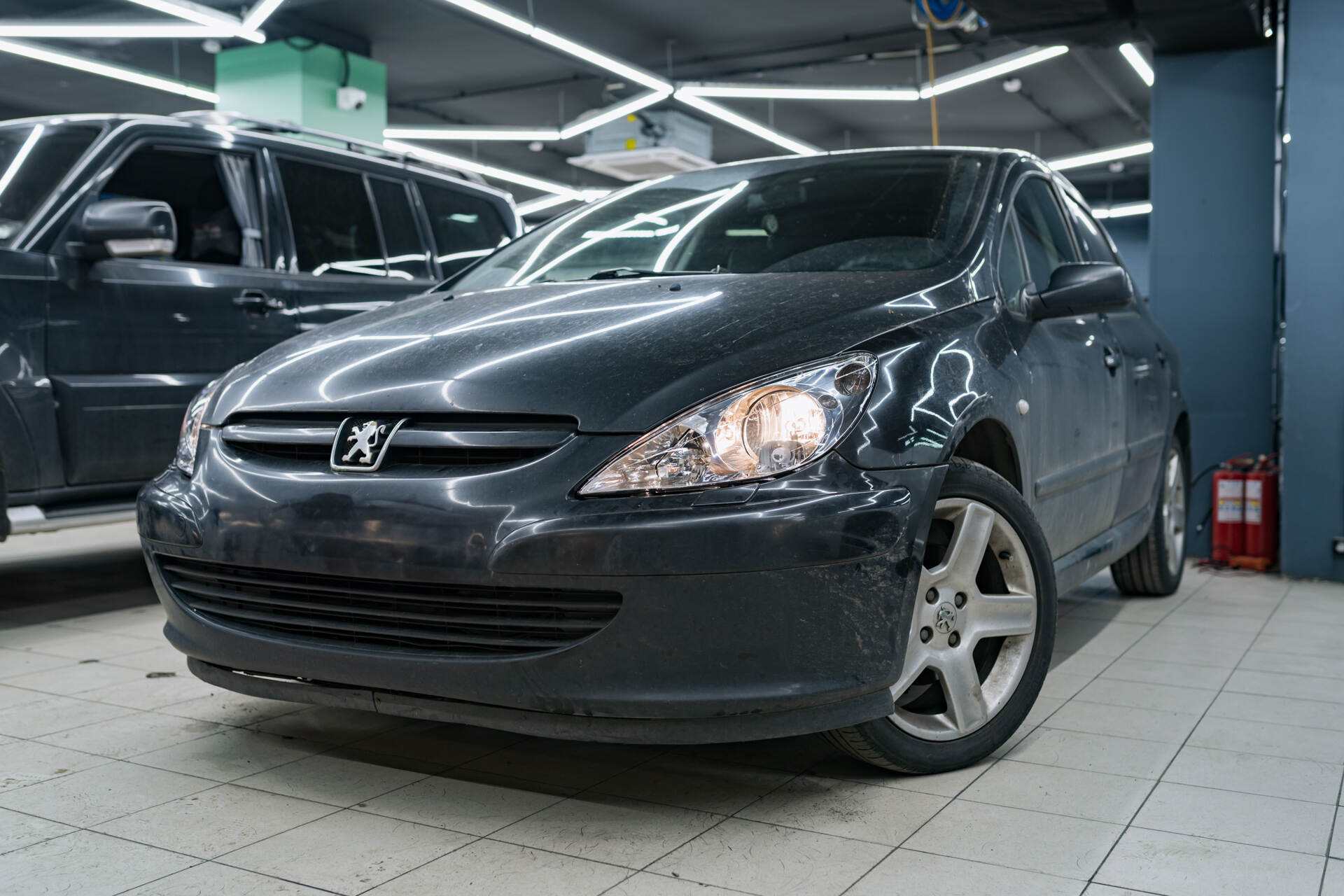 Замена стекол фар Peugeot 307 (2003) + их бронирование