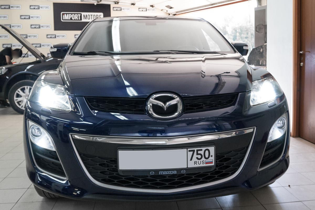 Линзы mazda cx 7. Мазда cx7 ксенон. ДХО Mazda CX-7. ДХО Мазда сх7. Линзы Мазда сх7.